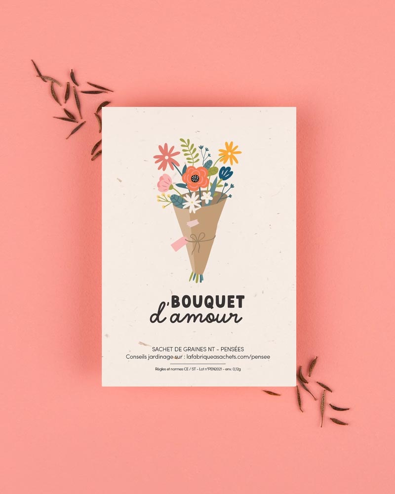 La Fabrique à Sachets - Liebesstrauß-Tütchen mit Stiefmütterchensamen, zeigt Blumenbouquet-Illustration, umgeben von gestreuten Samen, auf einer warmen Unterlage.