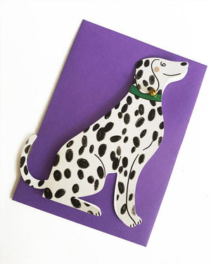 Formgestanzte Klappkarte Sitting Dalmatian Bell zeigt einen stilisierten Dalmatiner mit grüner Glocken-Halsband, ideal für Anlässe, nachhaltiges Design von Kitty Kenda.