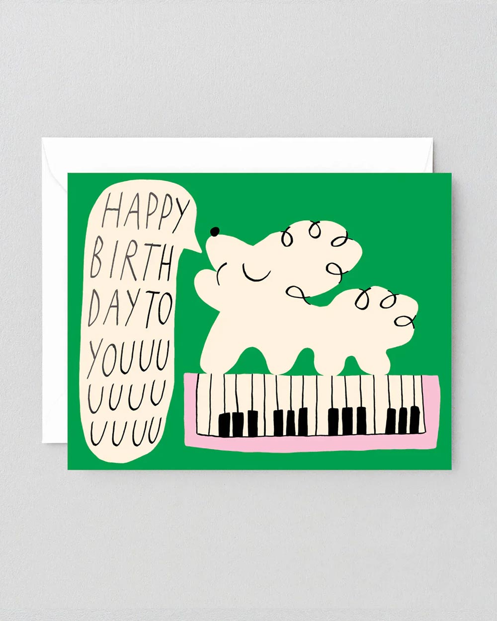 Happy Birthday To You Dogs & Keyboard Klappkarte mit illustriertem Hund auf Klavier, gestaltet von Odile Ferraille, inklusive Umschlag, gedruckt auf FSC-zertifiziertem Karton von WRAP Paper.