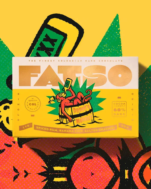 DRUNKN' MONKEY Dunkle Schokolade (60%) mit Gewürzrum, Bananenchips, gesalzene Cracker