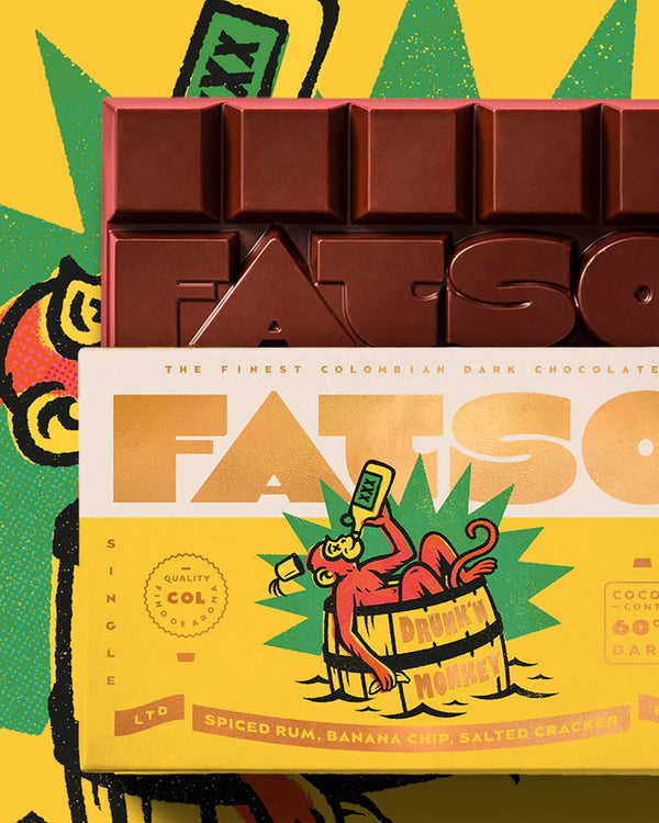 DRUNKN' MONKEY Dunkle Schokolade (60%) mit Gewürzrum, Bananenchips, gesalzene Cracker