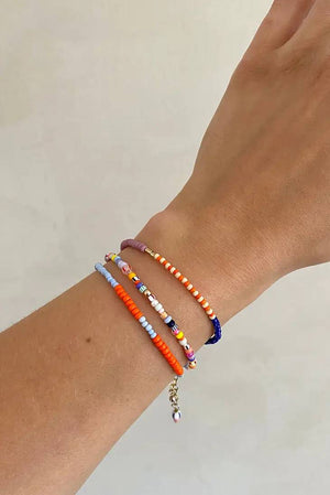 Lente Armband aus Glasperlen Deep blue - Clementine - Raspberry