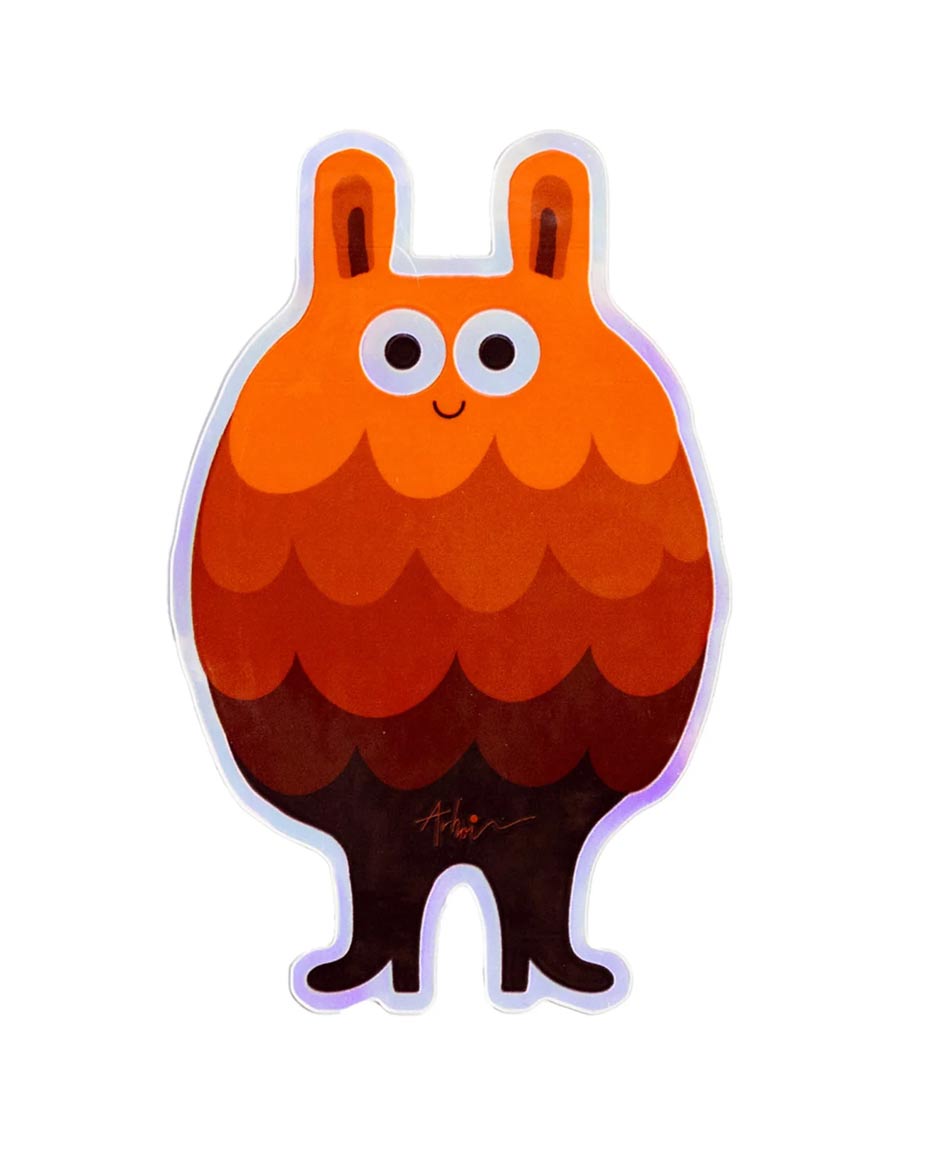 Studio Arhoj - Sticker Oak Friend: Cartoonwesen mit orange-braunem, gestreiftem Körper, langen Ohren, großen Augen und kleinem Lächeln. Perfekt für Laptop, Flasche oder Skateboard.