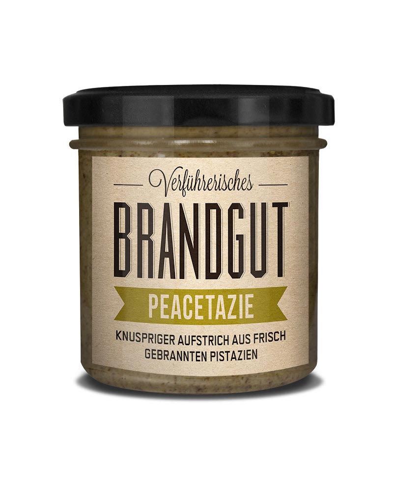 Peacetazie - Creme aus gebrannten Pistazien mit Meersalz in einem Glas, präsentiert als knuspriger Aufstrich. Enthält natürliche Zutaten, ohne Zusatzstoffe, von Brandgut.