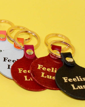 Feeling Lush Smiley Schlüsselanhänger Orange