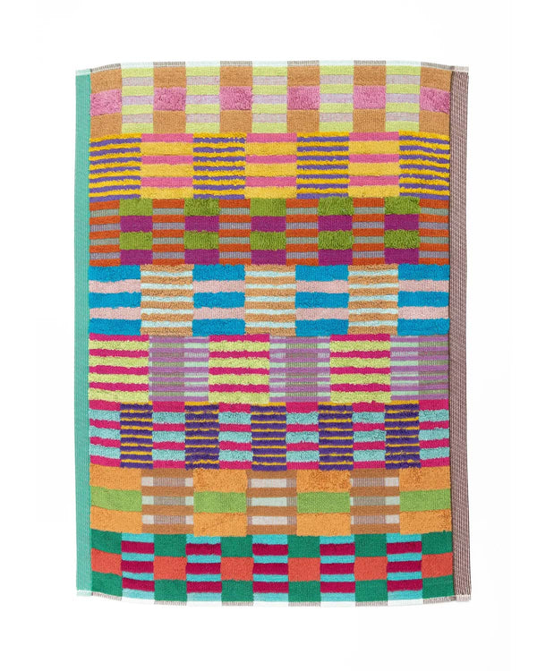 Bunte Odds & Ends Badematte #74 Tulip Quilt aus 100% Baumwolle, 60 x 80 cm, mit lebhaften gestreiften Farbblöcken und Aufhängeetikett, gefertigt in Portugal.