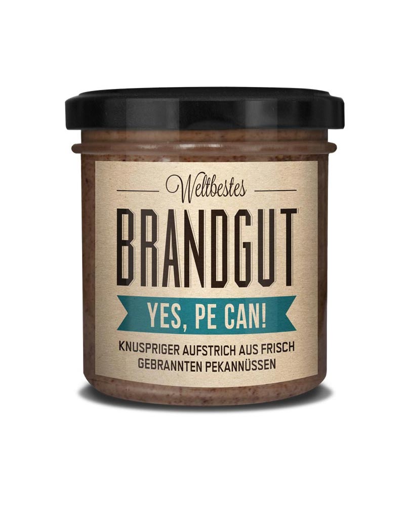Glas mit Yes! Pe can!-Creme aus gebrannten Pekannüssen mit Meersalz, knuspriger Aufstrich ohne Zusatzstoffe, von Brandgut, erhältlich im Human Empire Shop.